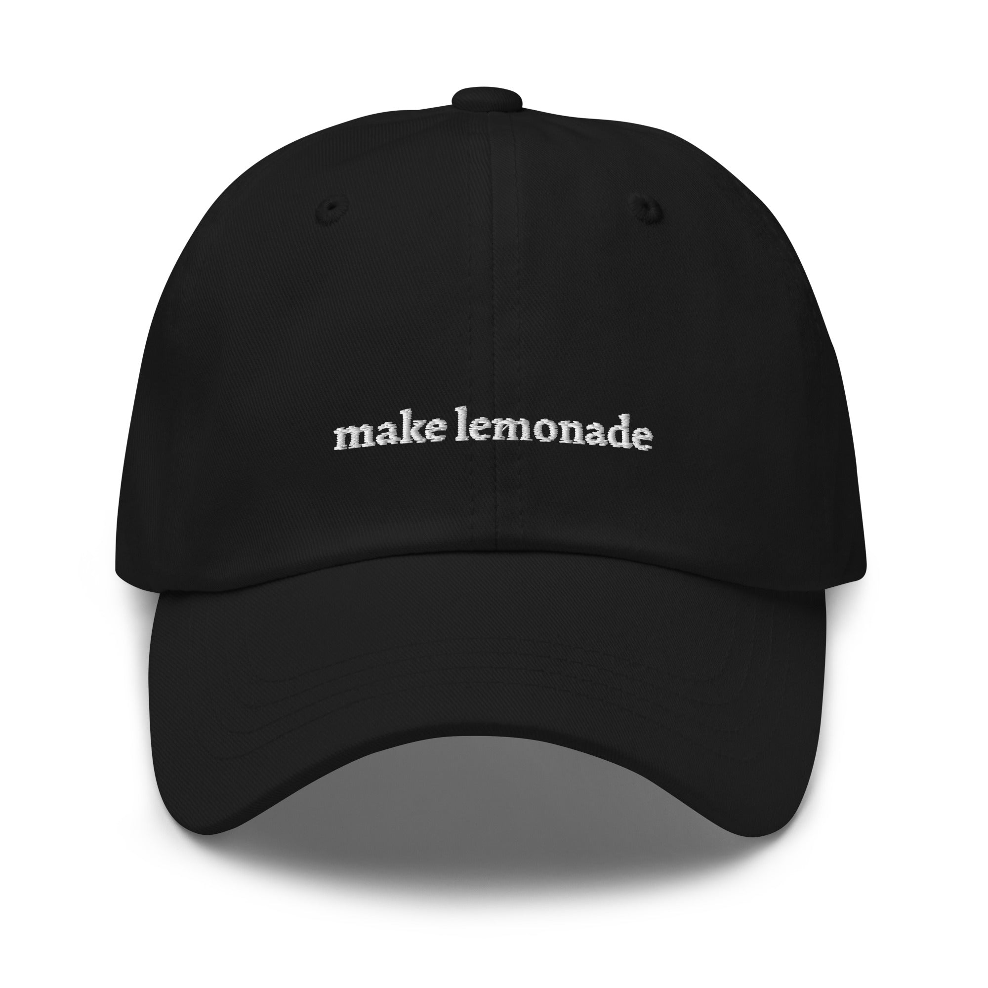 Black embroidered "make lemonade" dad hat front view | Plot Twist