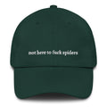 Green Spruce "not here to f*** spiders" dad hat front view | Plot Twist